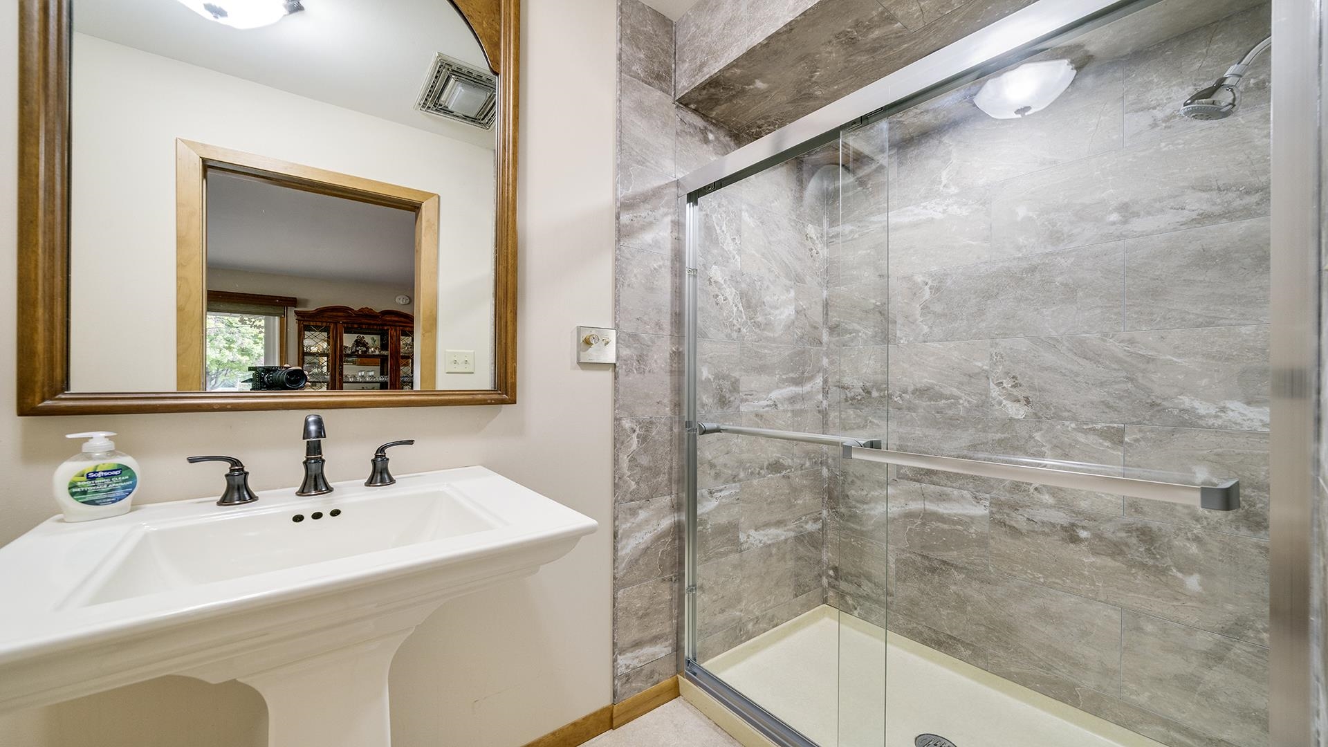310 Barbara Street Mount Morris, IL 61054 - Photo 14 of 36 a bathroom with a sink and a mirror