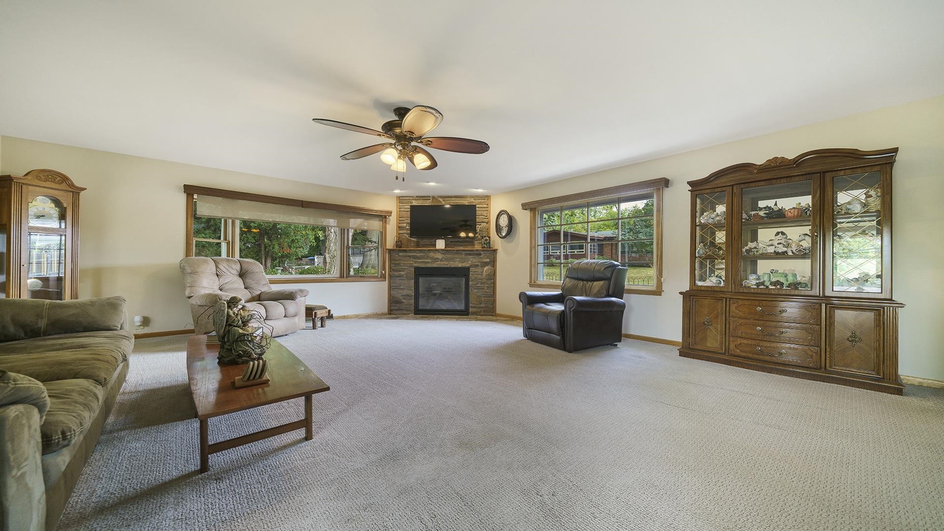 310 Barbara Street Mount Morris, IL 61054 - Photo 16 of 36 a living room with furniture and a large window