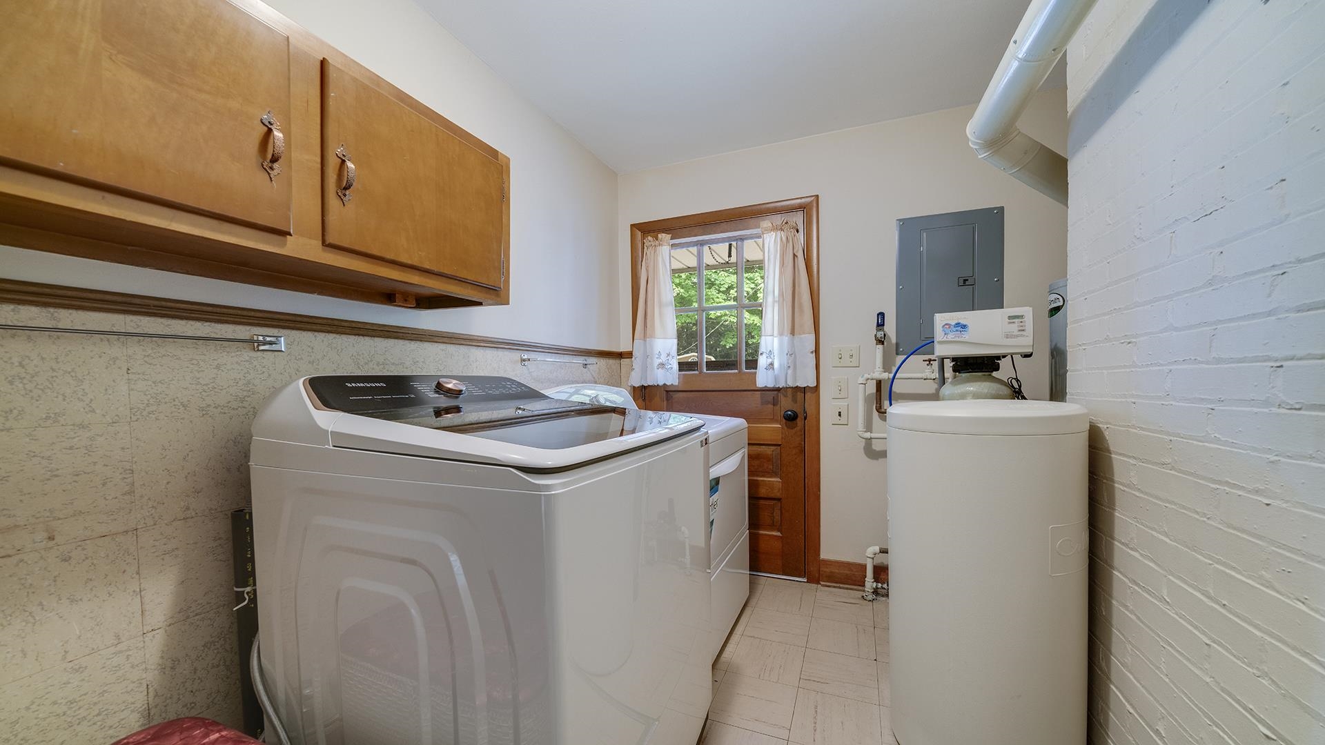 310 Barbara Street Mount Morris, IL 61054 - Photo 19 of 36 a view of storage and utility room with washer and dryer