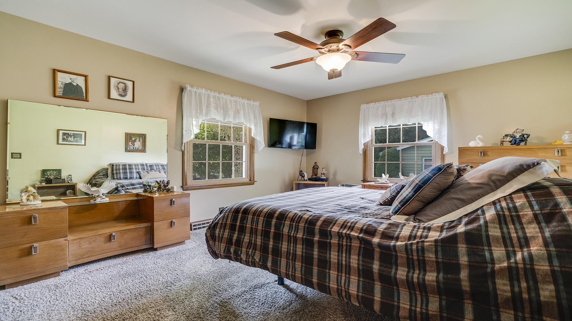 310 Barbara Street Mount Morris, IL 61054 - Photo 21 of 36 a bedroom with bed and window