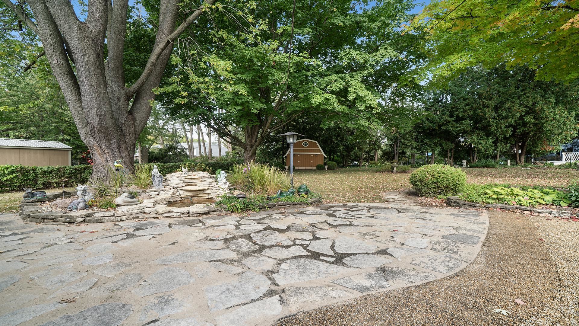 310 Barbara Street Mount Morris, IL 61054 - Photo 28 of 36 a view of a yard with a tree