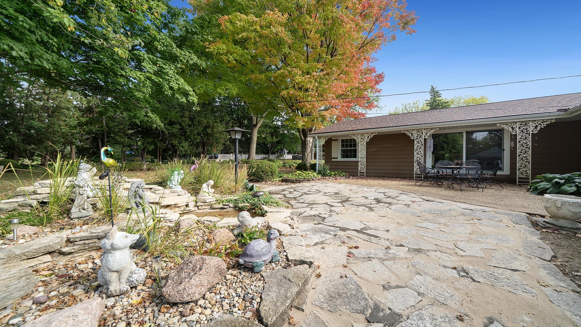 310 Barbara Street Mount Morris, IL 61054 - Photo 29 of 36 a view of a house with a yard