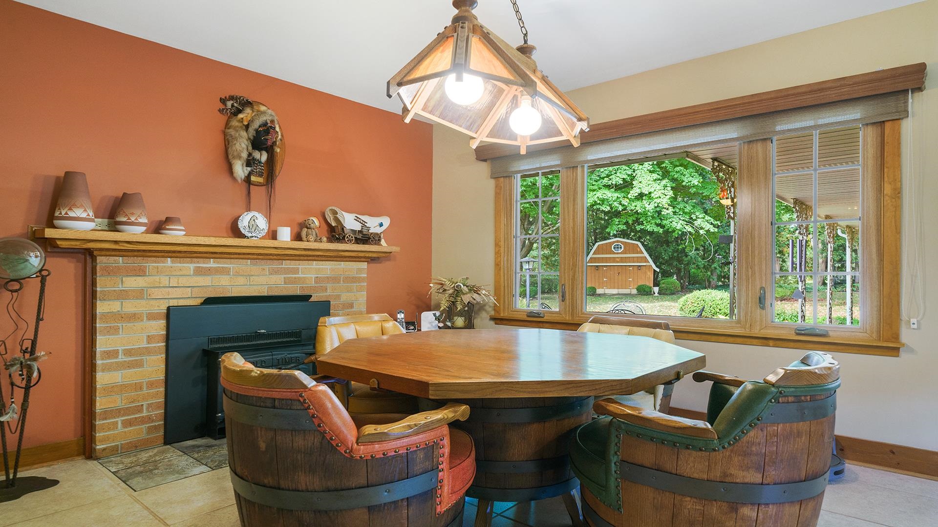 310 Barbara Street Mount Morris, IL 61054 - Photo 7 of 36 a outdoor living space with furniture and a fireplace