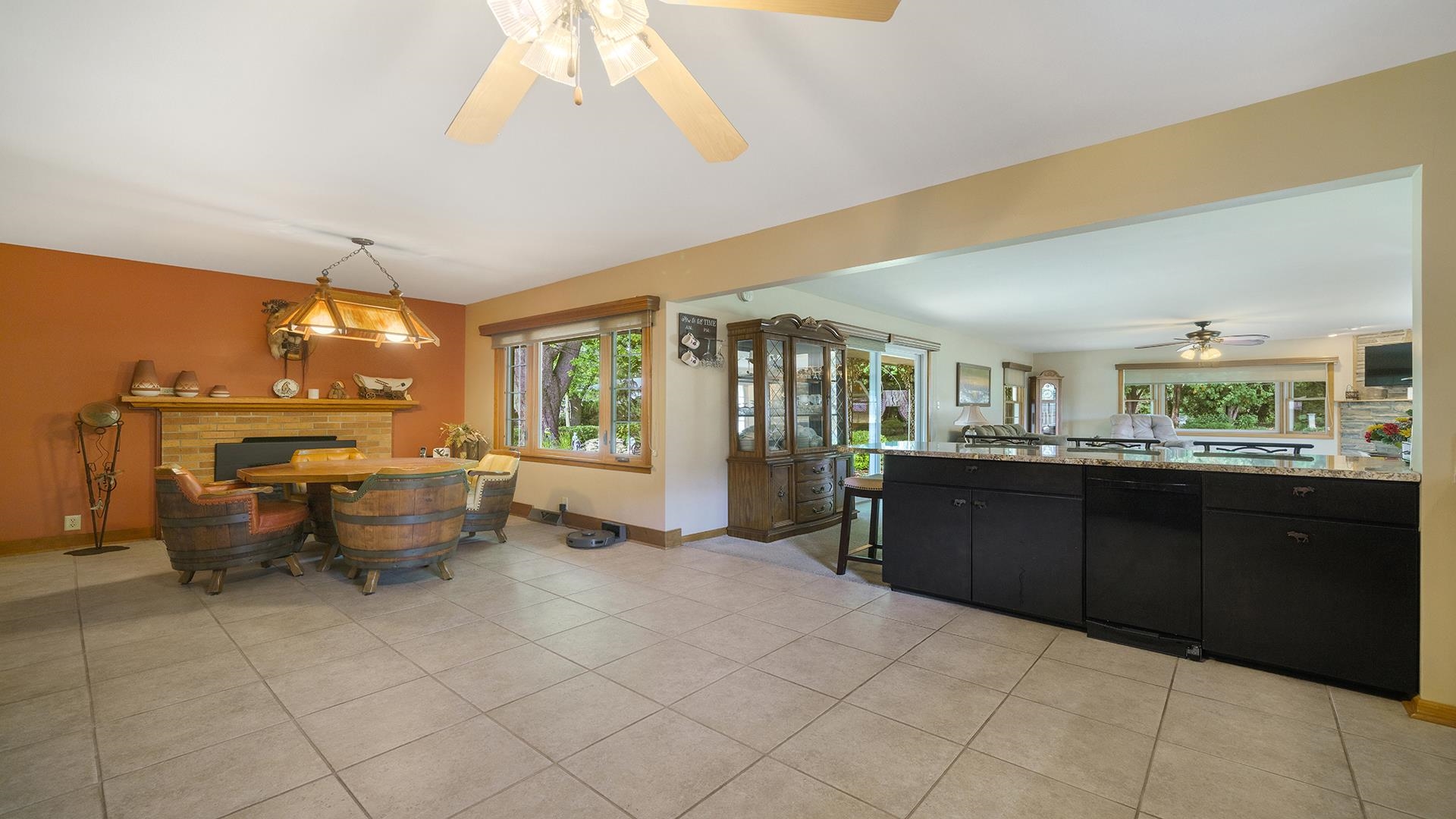 310 Barbara Street Mount Morris, IL 61054 - Photo 10 of 36 a kitchen with a wooden cabinets and dining area