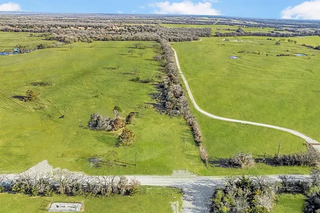 a view of a swimming pool and an outdoor space