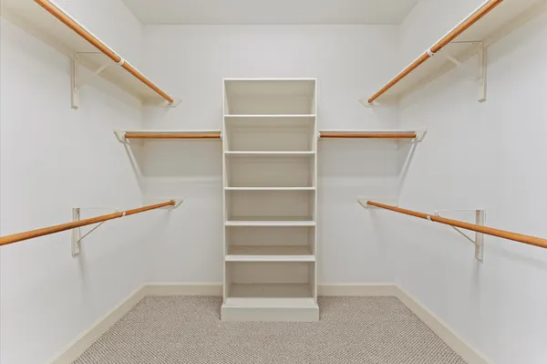 a view of an empty walk in closet