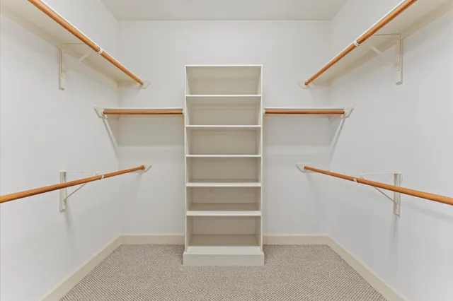 a view of an empty walk in closet