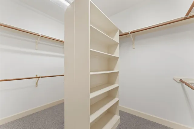 a view of an empty walk in closet
