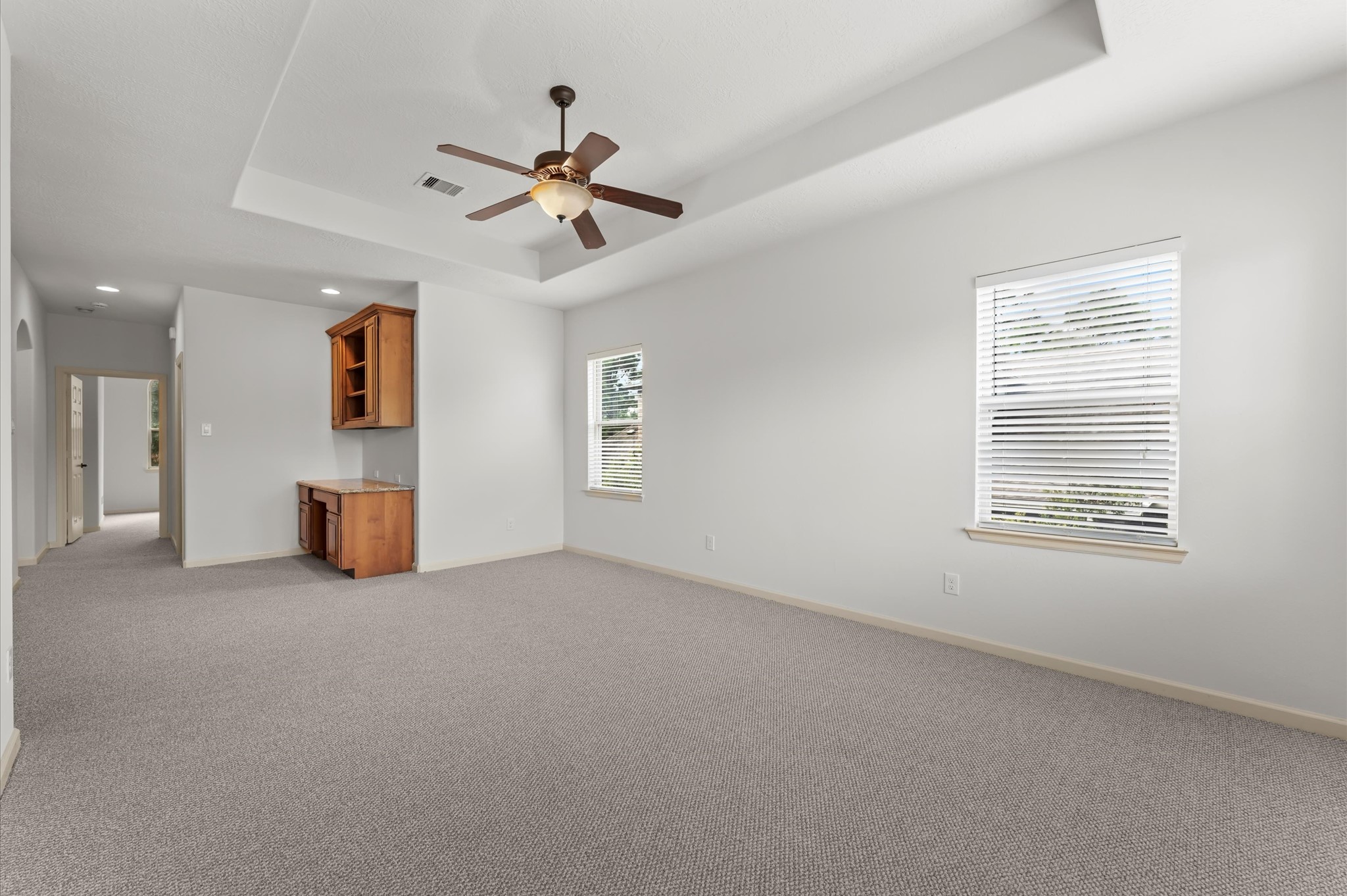 3 North Beech Springs Circle Spring, TX 77389 - Photo 30 of 43 a view of a livingroom with a ceiling fan and window