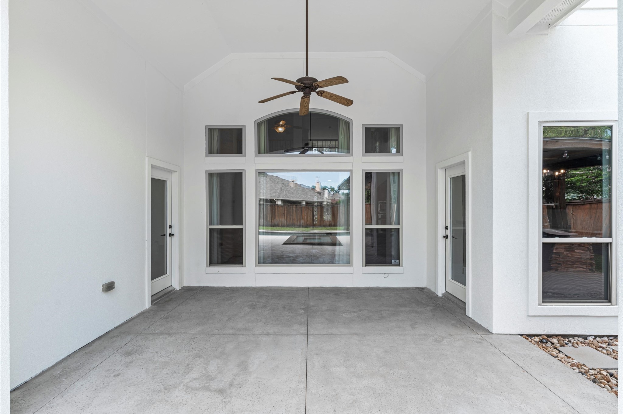 3 North Beech Springs Circle Spring, TX 77389 - Photo 40 of 43 a view of a hall with windows and a fireplace