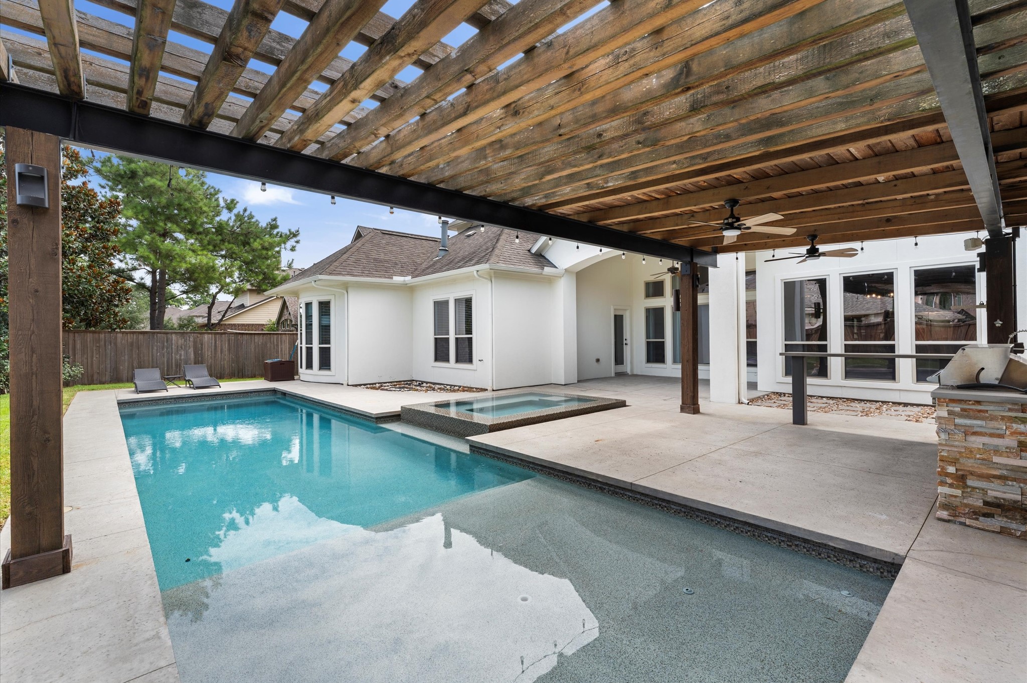 3 North Beech Springs Circle Spring, TX 77389 - Photo 42 of 43 a swimming pool with outdoor seating and yard