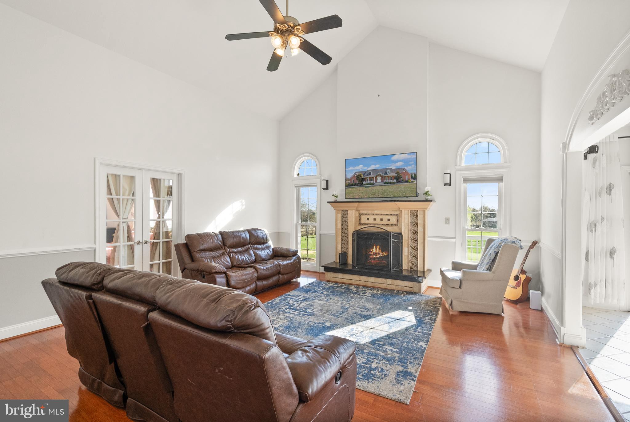 13145 Carriage Ford Road Nokesville, VA 20181 - Photo 18 of 70 a living room with furniture and a fireplace