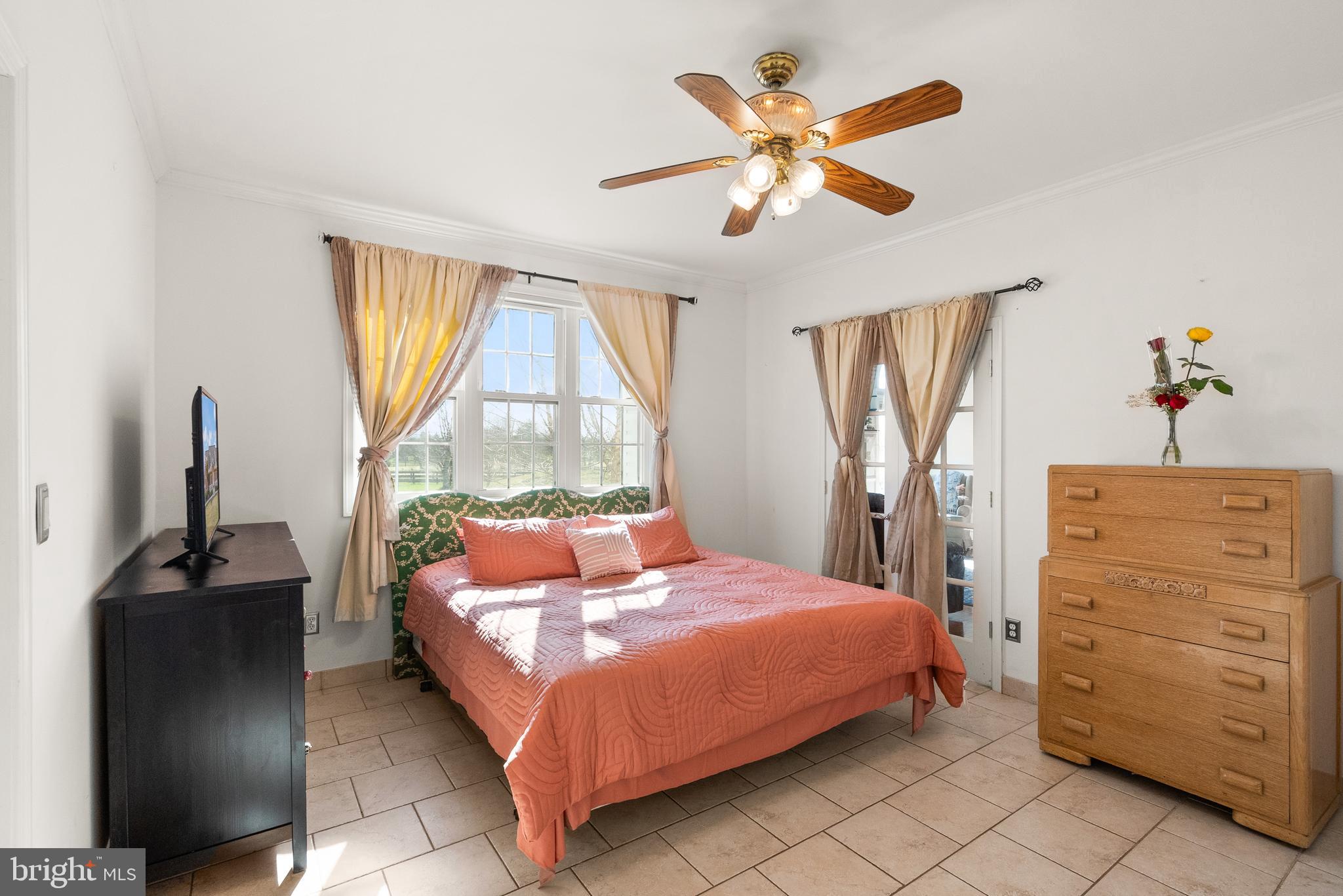 13145 Carriage Ford Road Nokesville, VA 20181 - Photo 25 of 70 a bedroom with a bed and with furniture