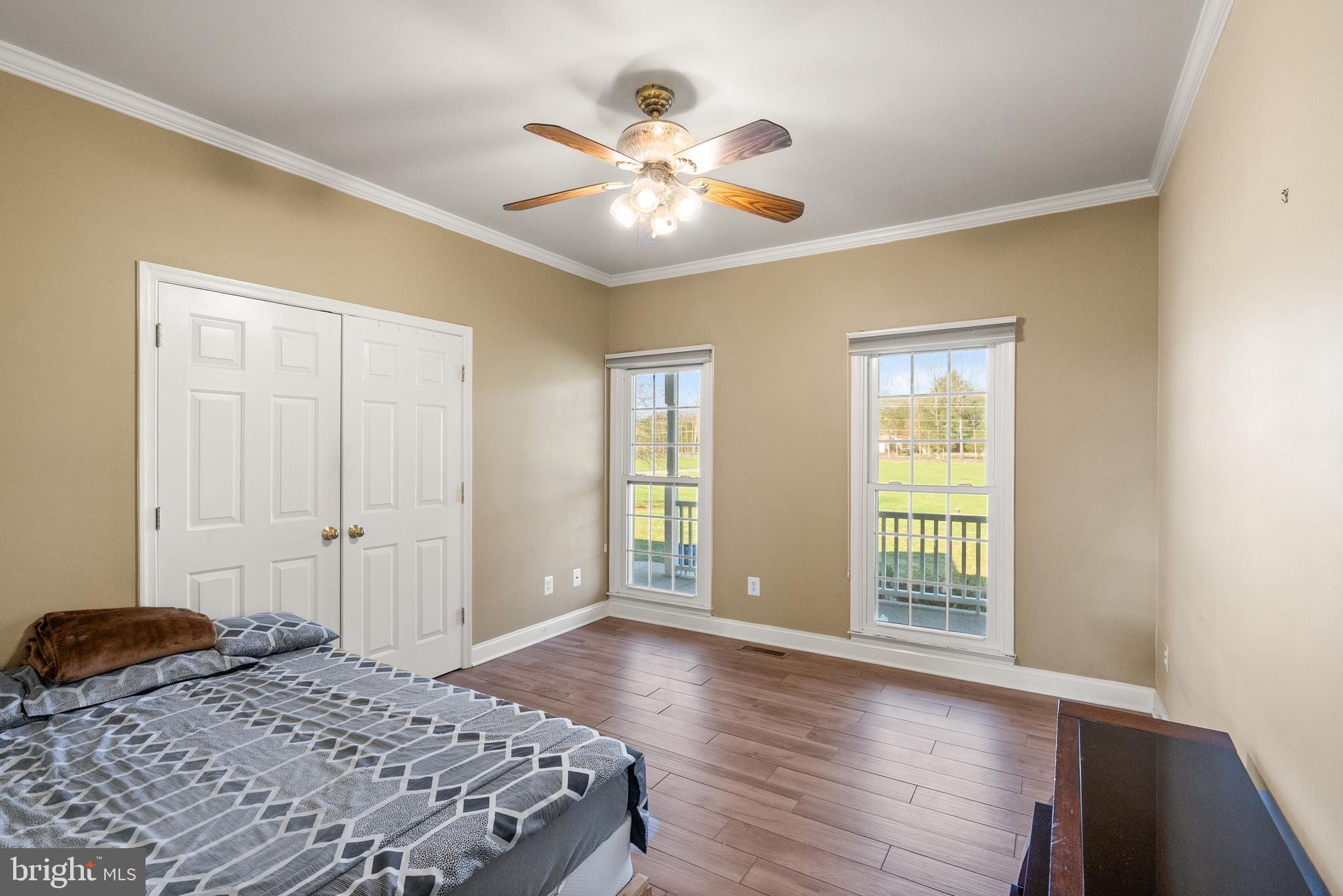 13145 Carriage Ford Road Nokesville, VA 20181 - Photo 28 of 70 a bedroom with a large bed and a window