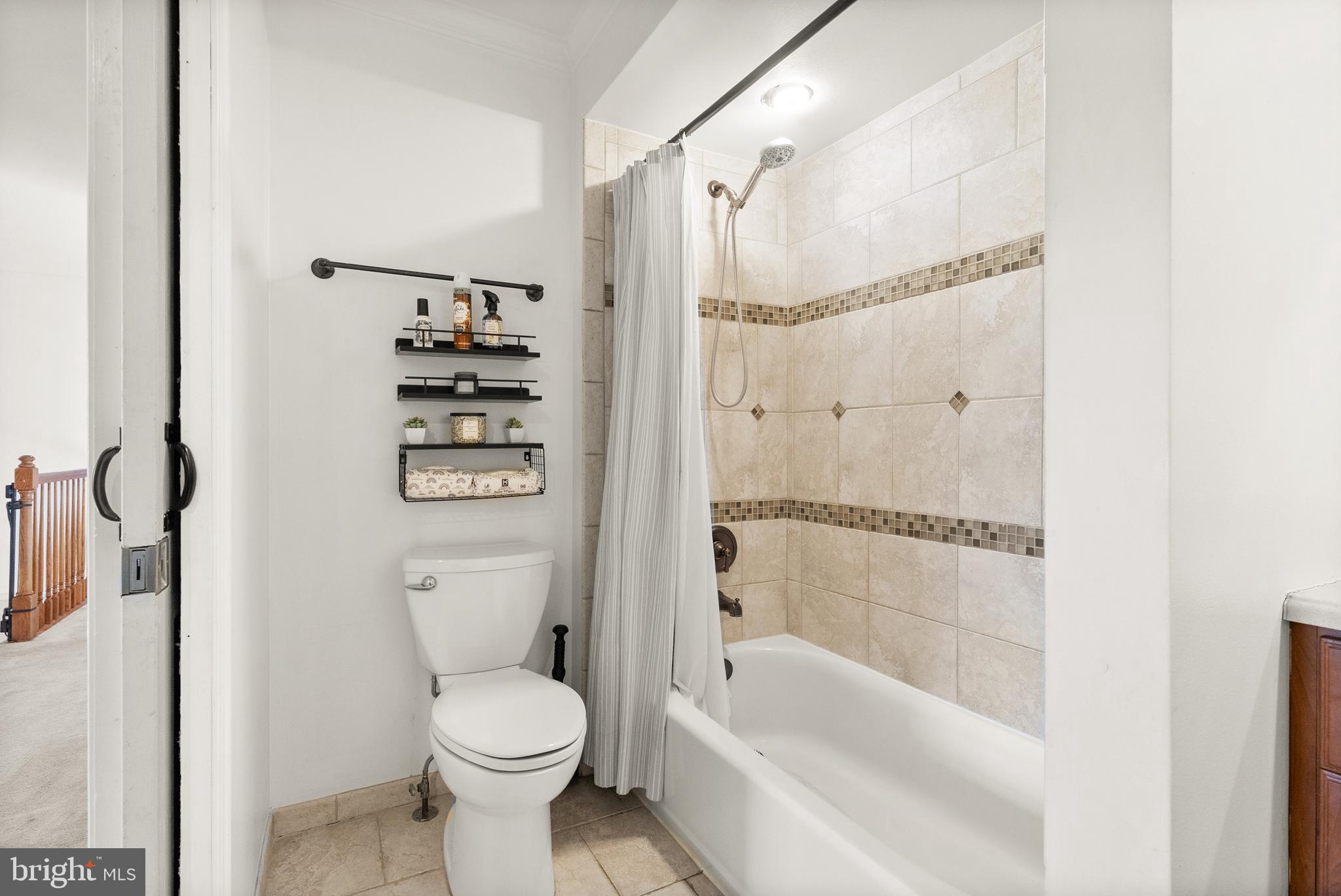 13145 Carriage Ford Road Nokesville, VA 20181 - Photo 35 of 70 a bathroom with a toilet and a shower