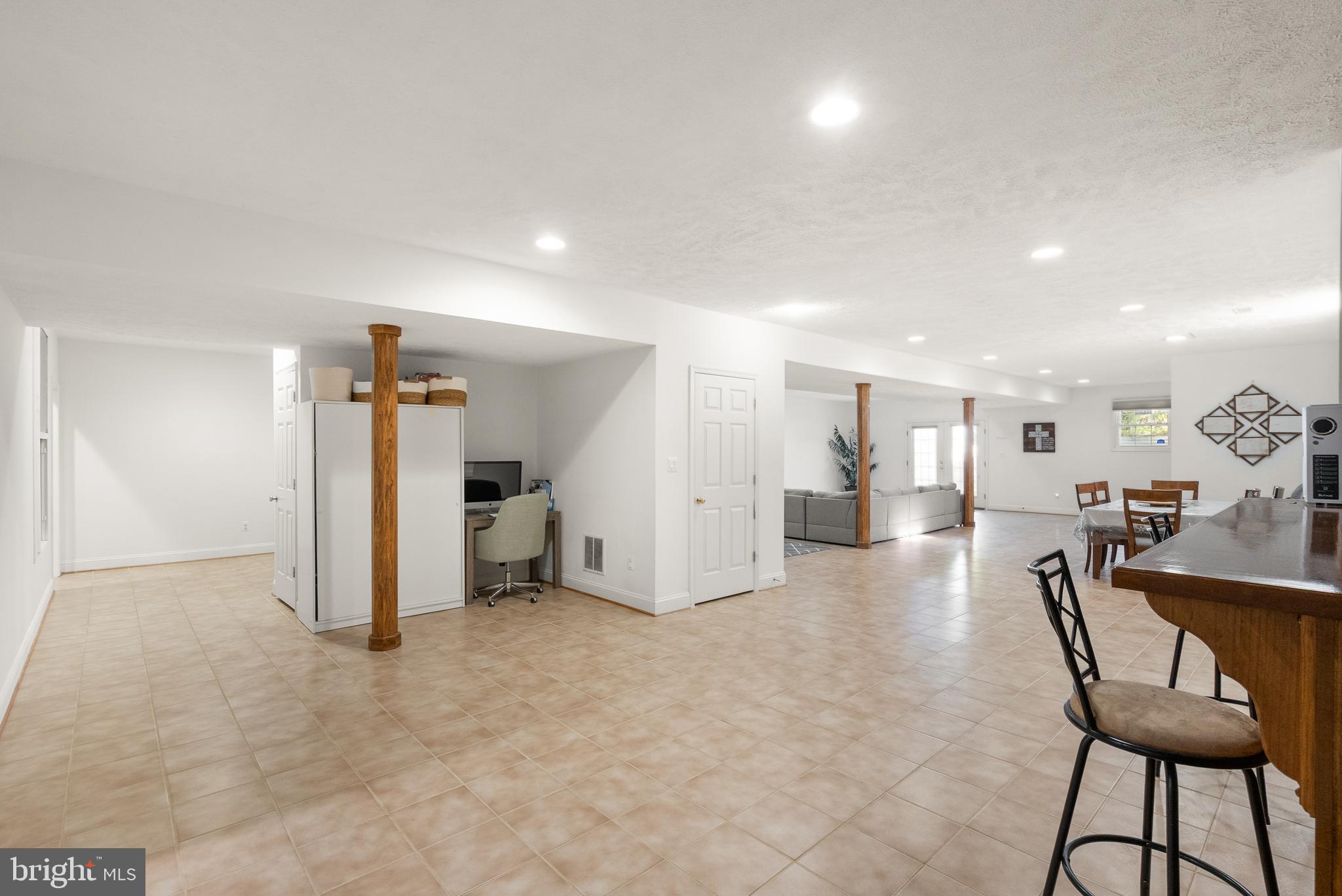 13145 Carriage Ford Road Nokesville, VA 20181 - Photo 43 of 70 a view of a livingroom with furniture and a hallway
