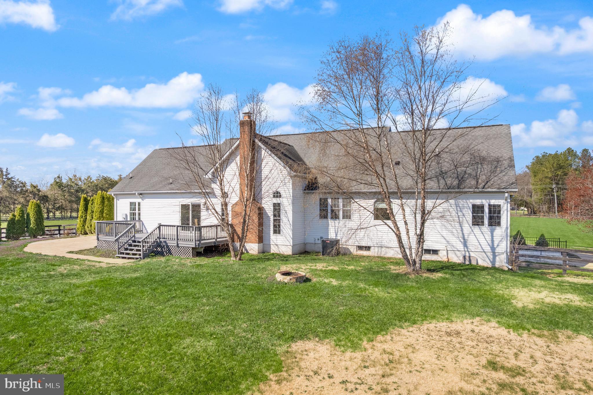 13145 Carriage Ford Road Nokesville, VA 20181 - Photo 56 of 70 a view of a house with a yard