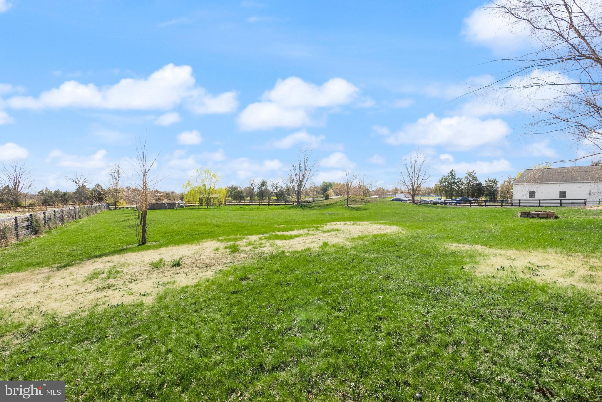 13145 Carriage Ford Road Nokesville, VA 20181 - Photo 59 of 70 a view of a golf course with a lake