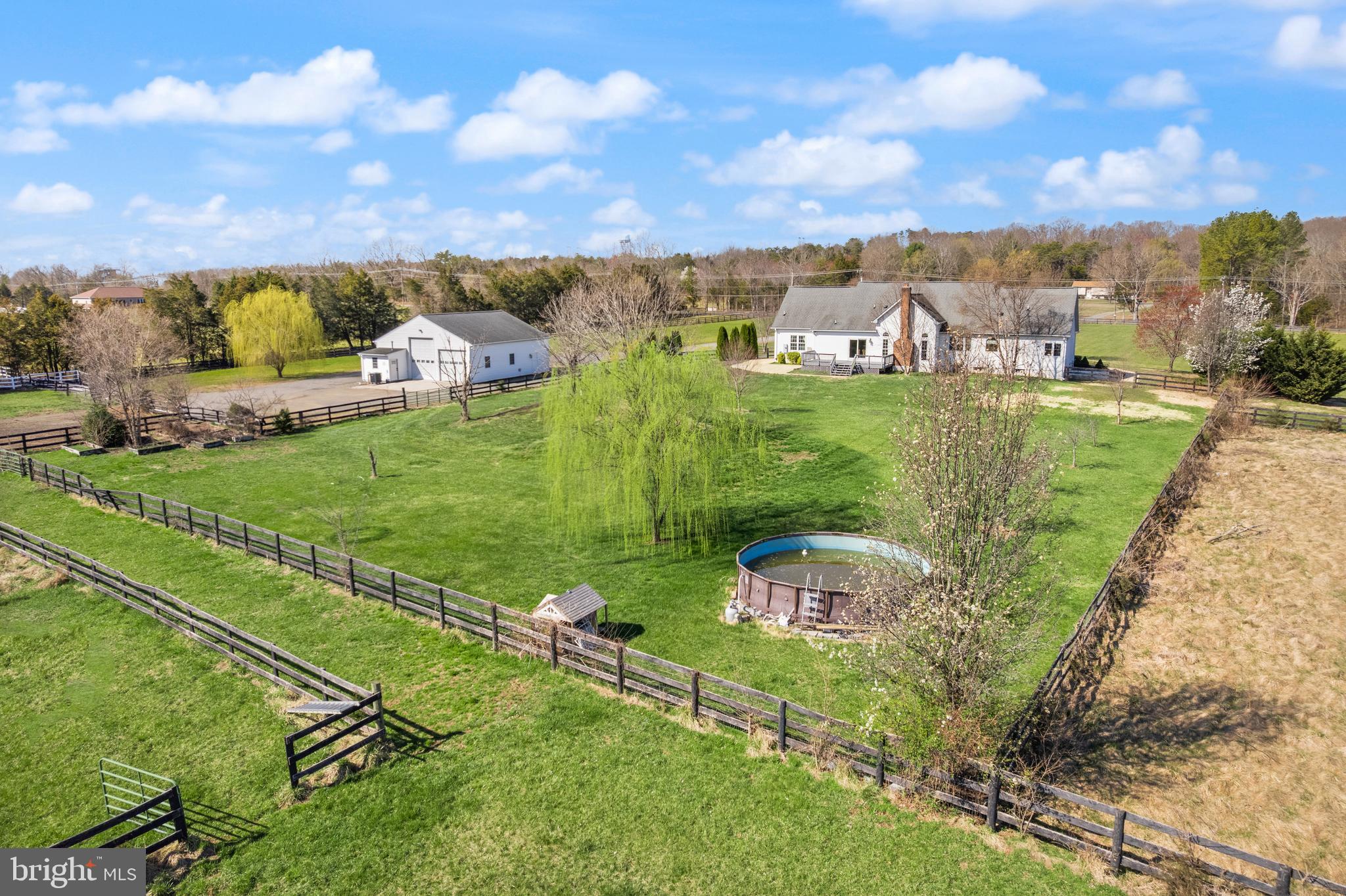 13145 Carriage Ford Road Nokesville, VA 20181 - Photo 6 of 70 an aerial view of a house with a garden