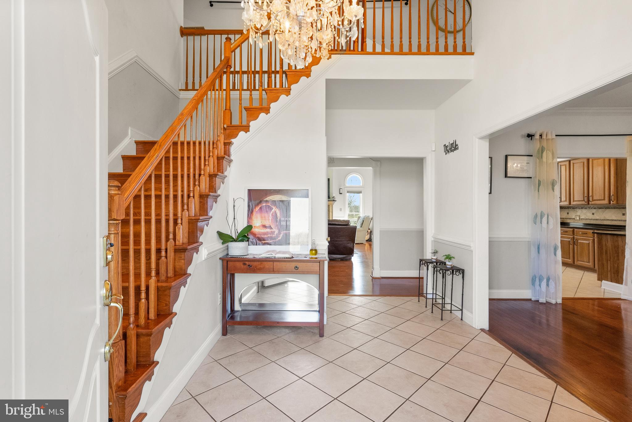 13145 Carriage Ford Road Nokesville, VA 20181 - Photo 8 of 70 a view of entryway livingroom and hall with wooden floor