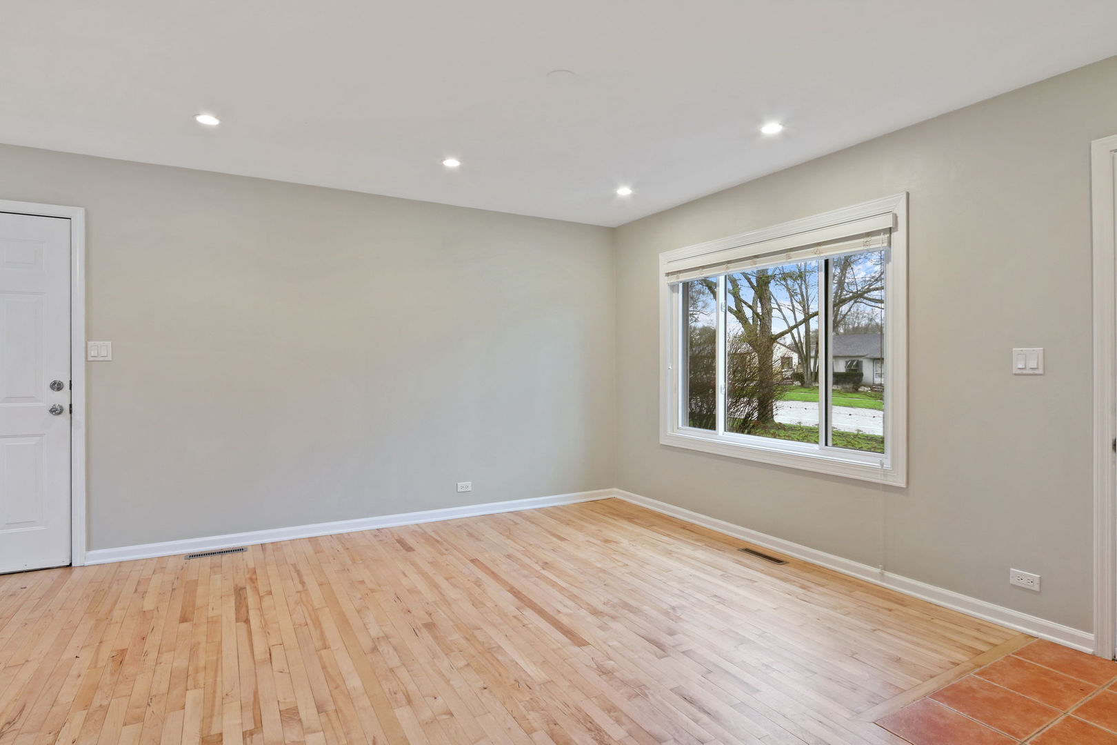 273 Raupp Boulevard Buffalo Grove, IL 60089 - Photo 2 of 18 a view of empty room with window