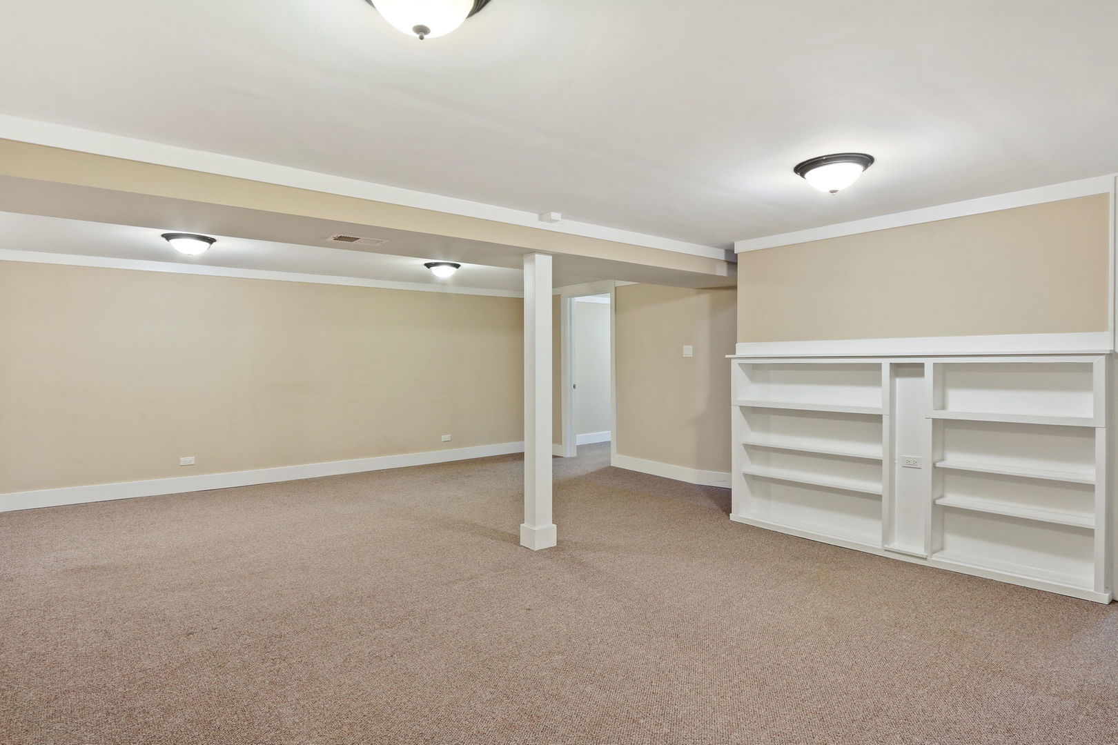 273 Raupp Boulevard Buffalo Grove, IL 60089 - Photo 14 of 18 a view of an empty room with a window