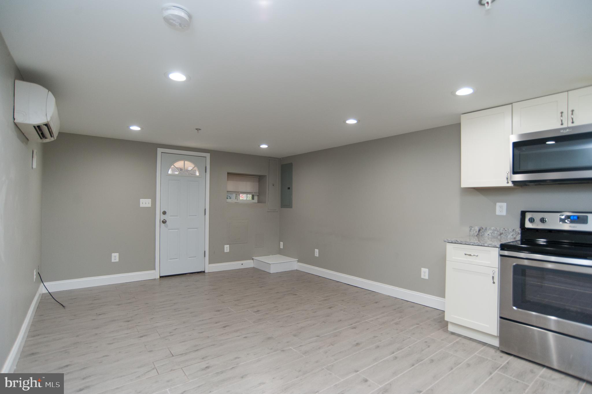 2022 4th Street Northeast, Unit B Washington, DC 20002 - Photo 8 of 16 a view of kitchen with microwave and stove