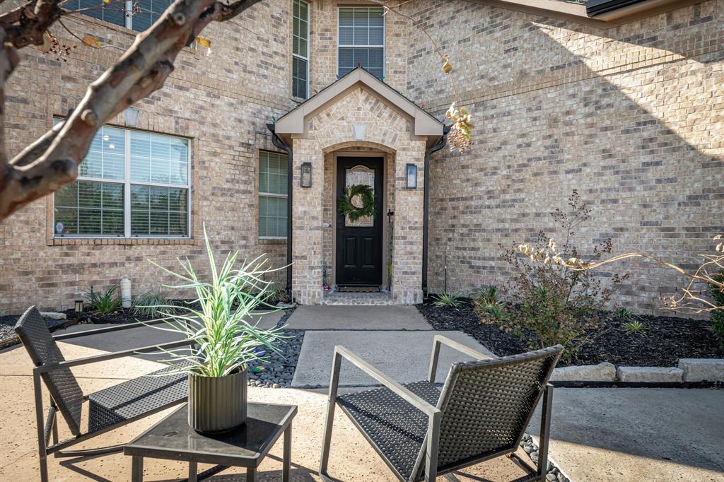 14521 Crystal Lake Drive Little Elm, TX 75068 - Photo 2 of 40 a front view of a house with outdoor seating