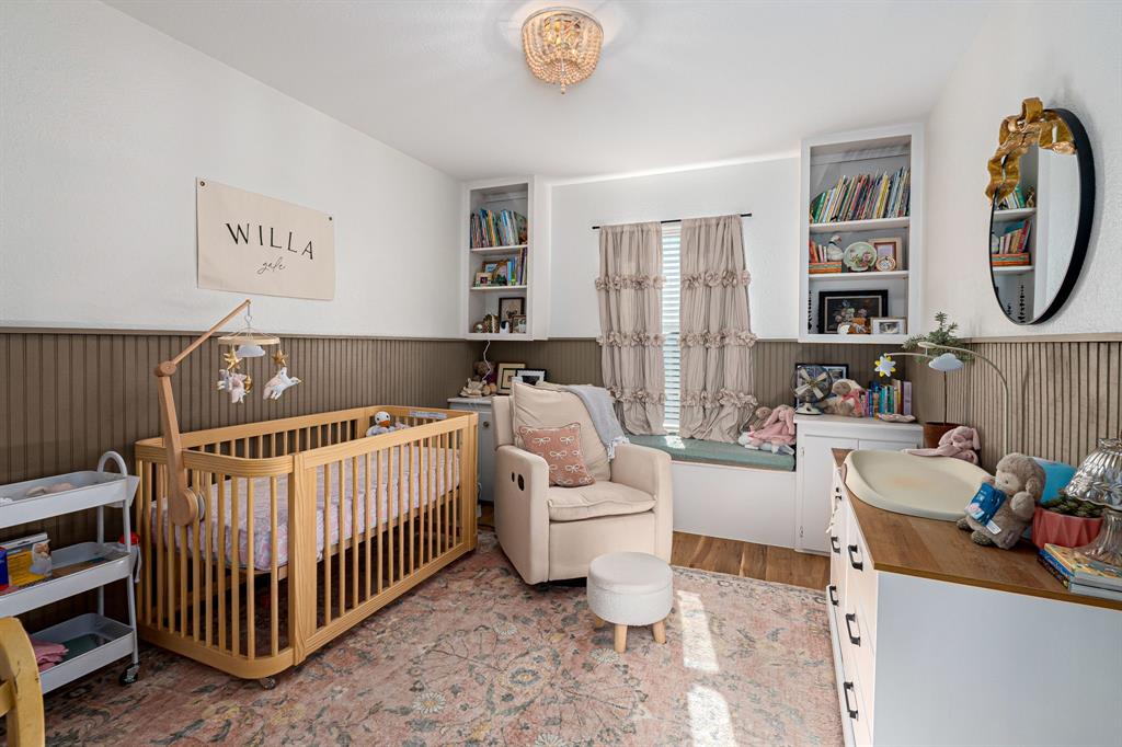 14521 Crystal Lake Drive Little Elm, TX 75068 - Photo 24 of 40 a bedroom with furniture and a window