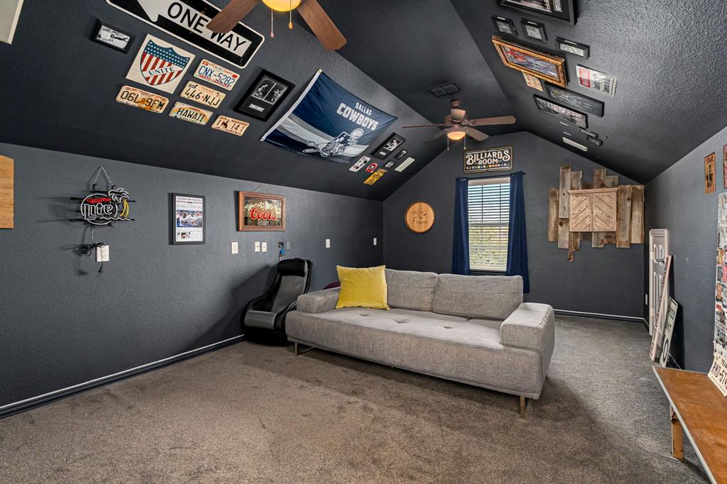 14521 Crystal Lake Drive Little Elm, TX 75068 - Photo 29 of 40 a living room with furniture