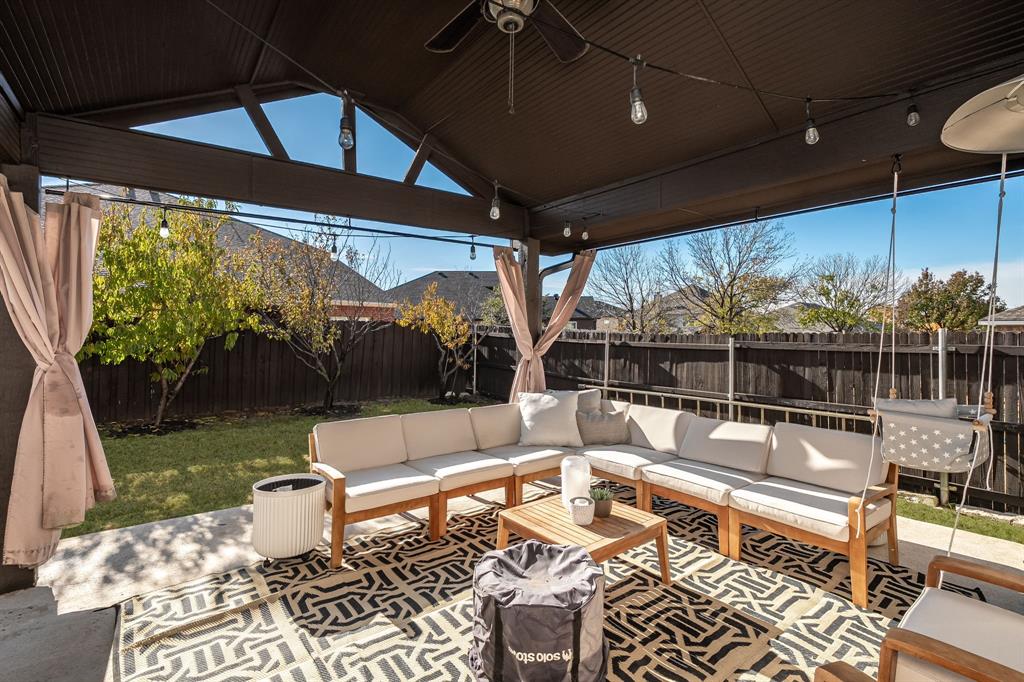 14521 Crystal Lake Drive Little Elm, TX 75068 - Photo 31 of 40 a outdoor space with the couches and dining table with the garden view