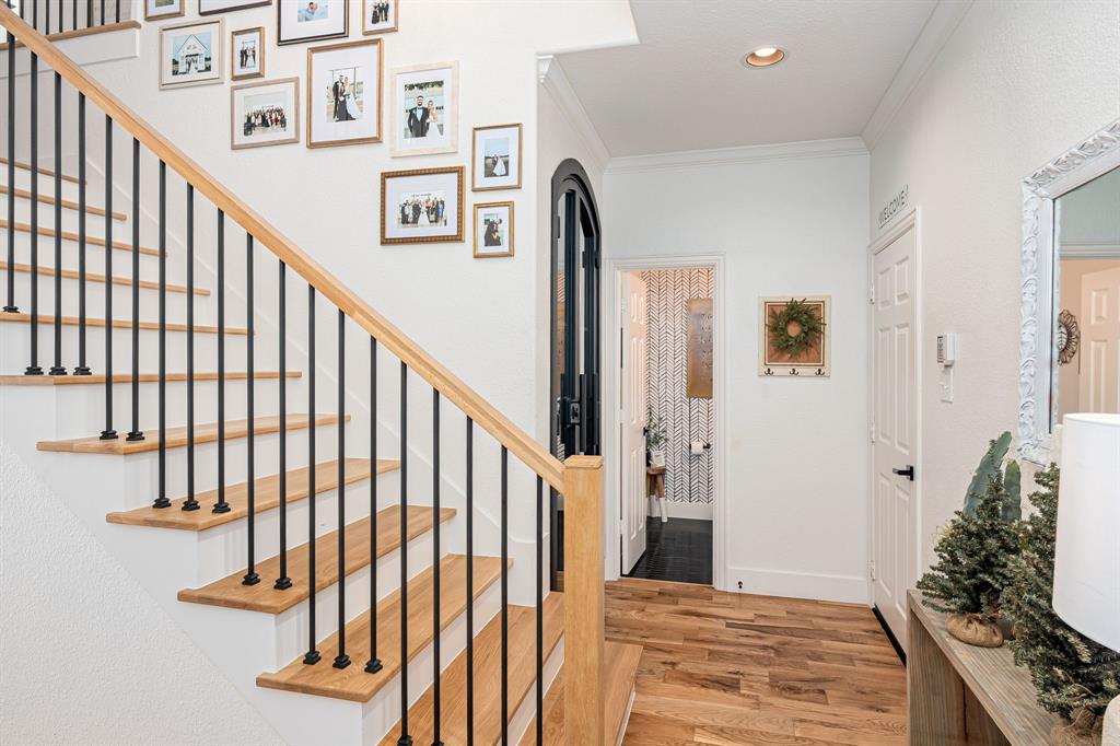 14521 Crystal Lake Drive Little Elm, TX 75068 - Photo 4 of 40 a view of entryway with wooden floor