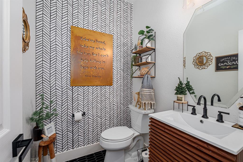 14521 Crystal Lake Drive Little Elm, TX 75068 - Photo 7 of 40 a bathroom with a sink and a toilet