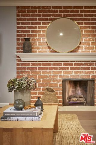 a view of a water heater and a cabinet