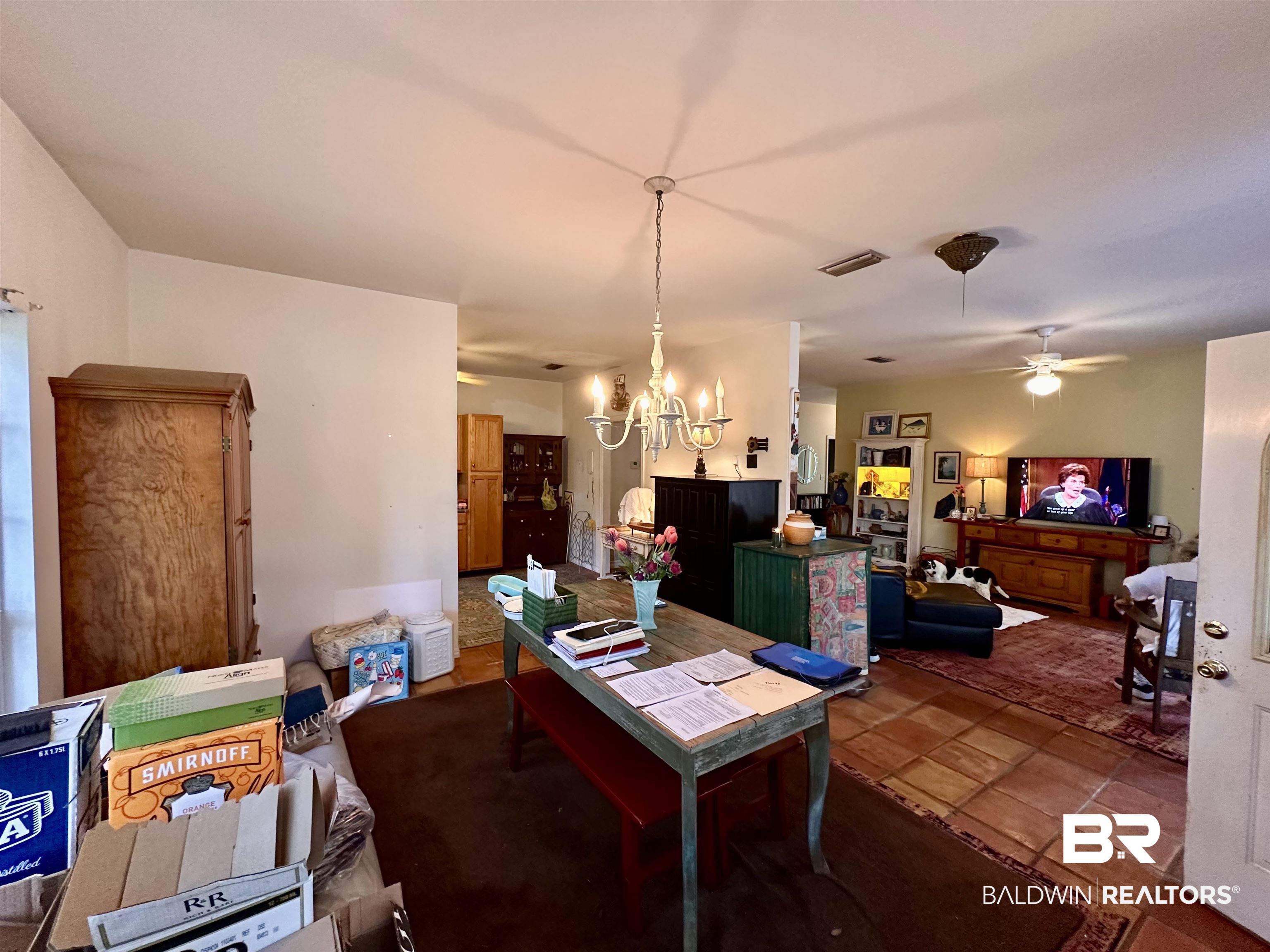 9101 Coronada Road Elberta, AL 36530 - Photo 15 of 27 Dining room featuring a chandelier and a ceiling fan