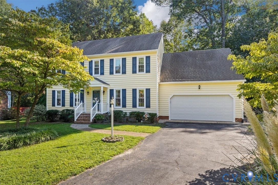 13905 Shadow Ridge Lane Midlothian, VA 23112 - Photo 1 of 55 Two-story residence with light yellow siding, blue