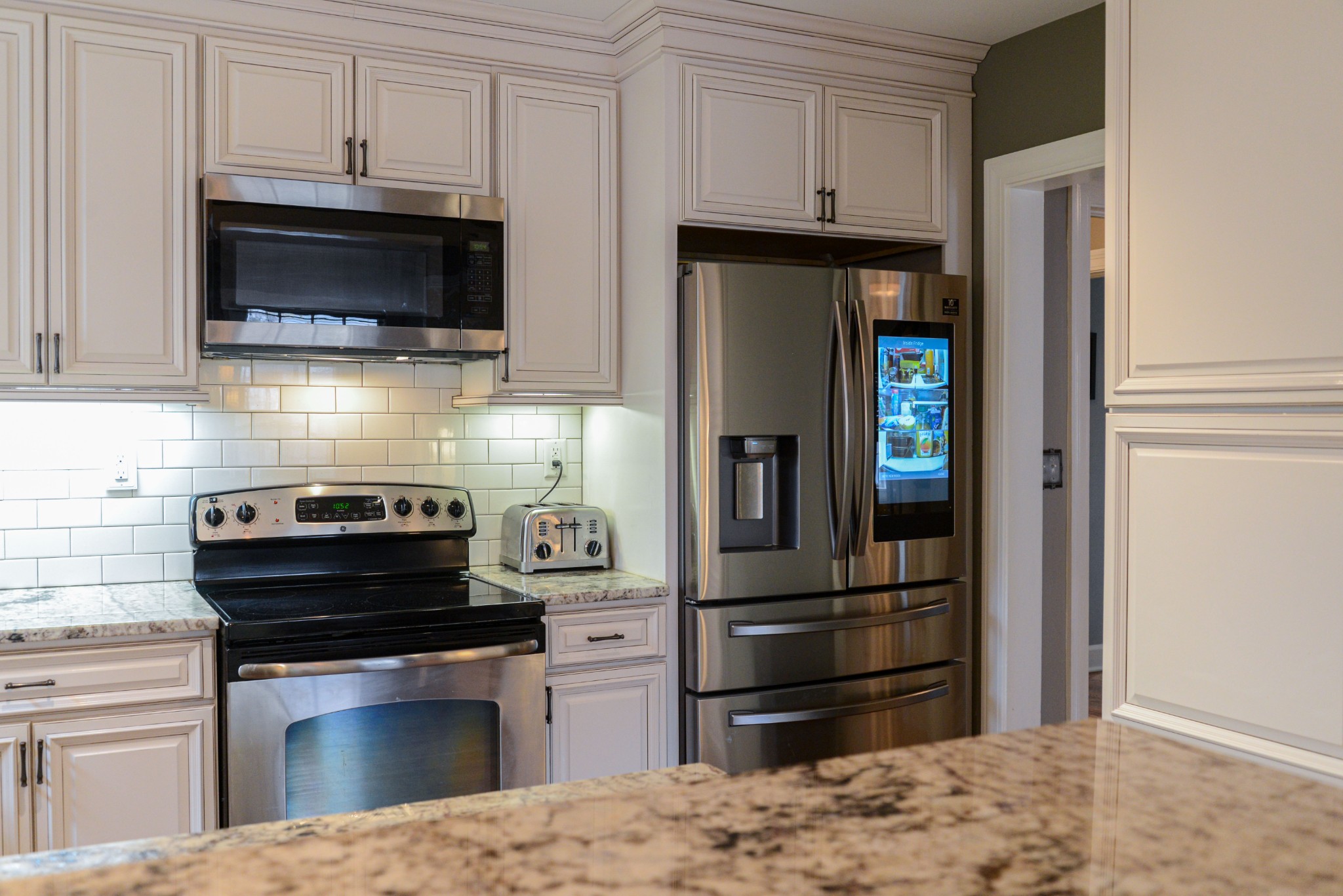 2905 Snowden Road Nashville, TN 37204 - Photo 14 of 40 a kitchen with a refrigerator stove and microwave