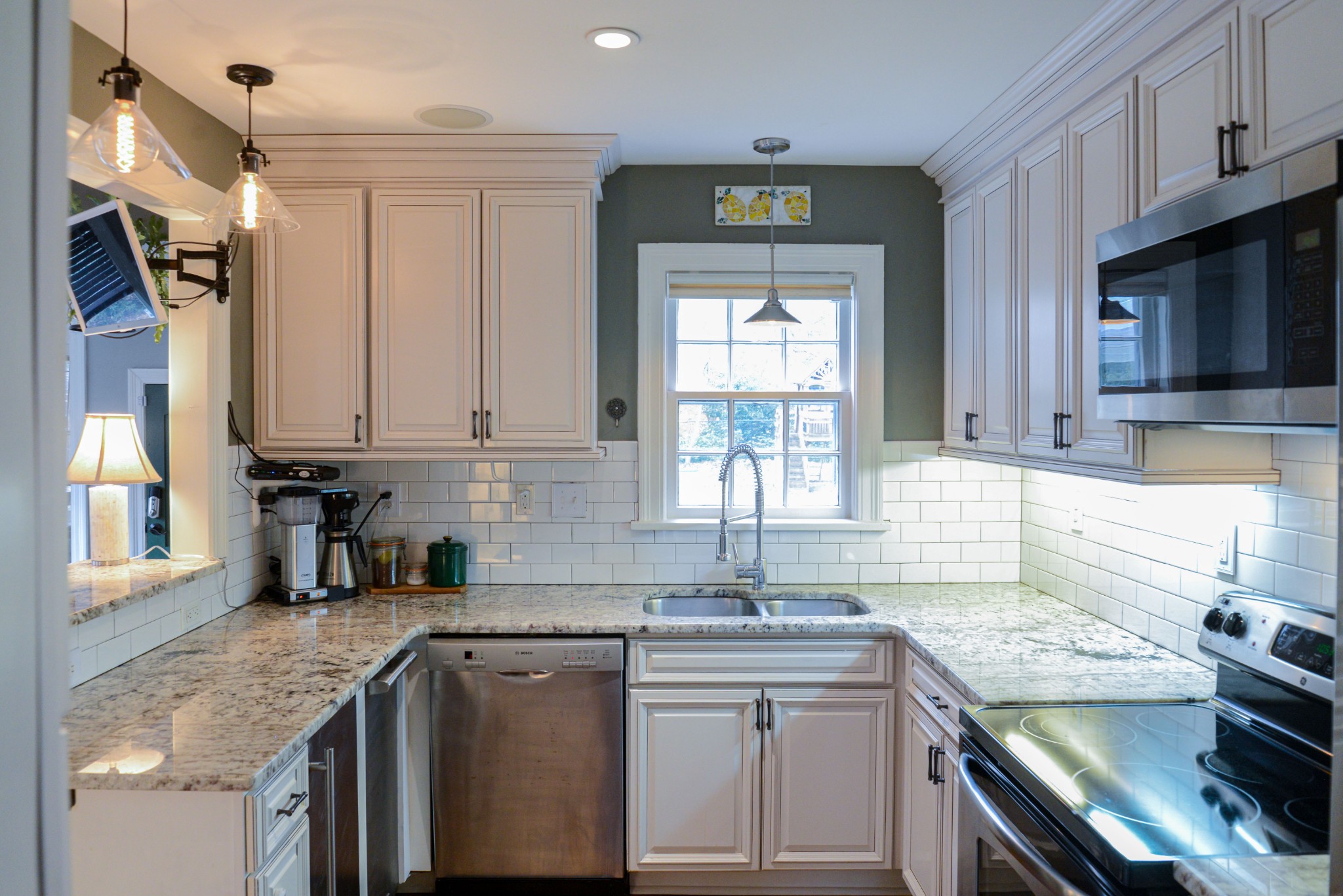 2905 Snowden Road Nashville, TN 37204 - Photo 15 of 40 a kitchen with stainless steel appliances granite countertop a sink stove and cabinets