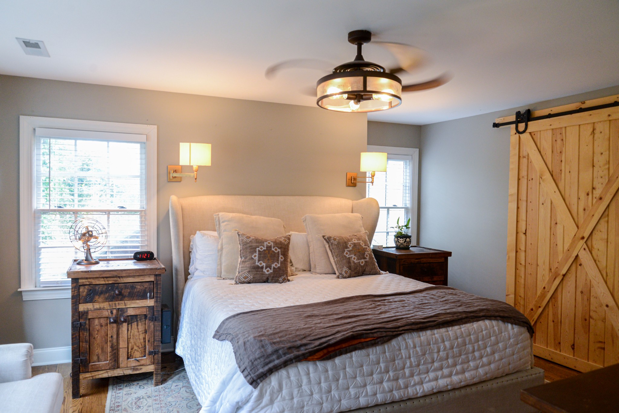 2905 Snowden Road Nashville, TN 37204 - Photo 27 of 40 a bedroom with a large bed and a chandelier