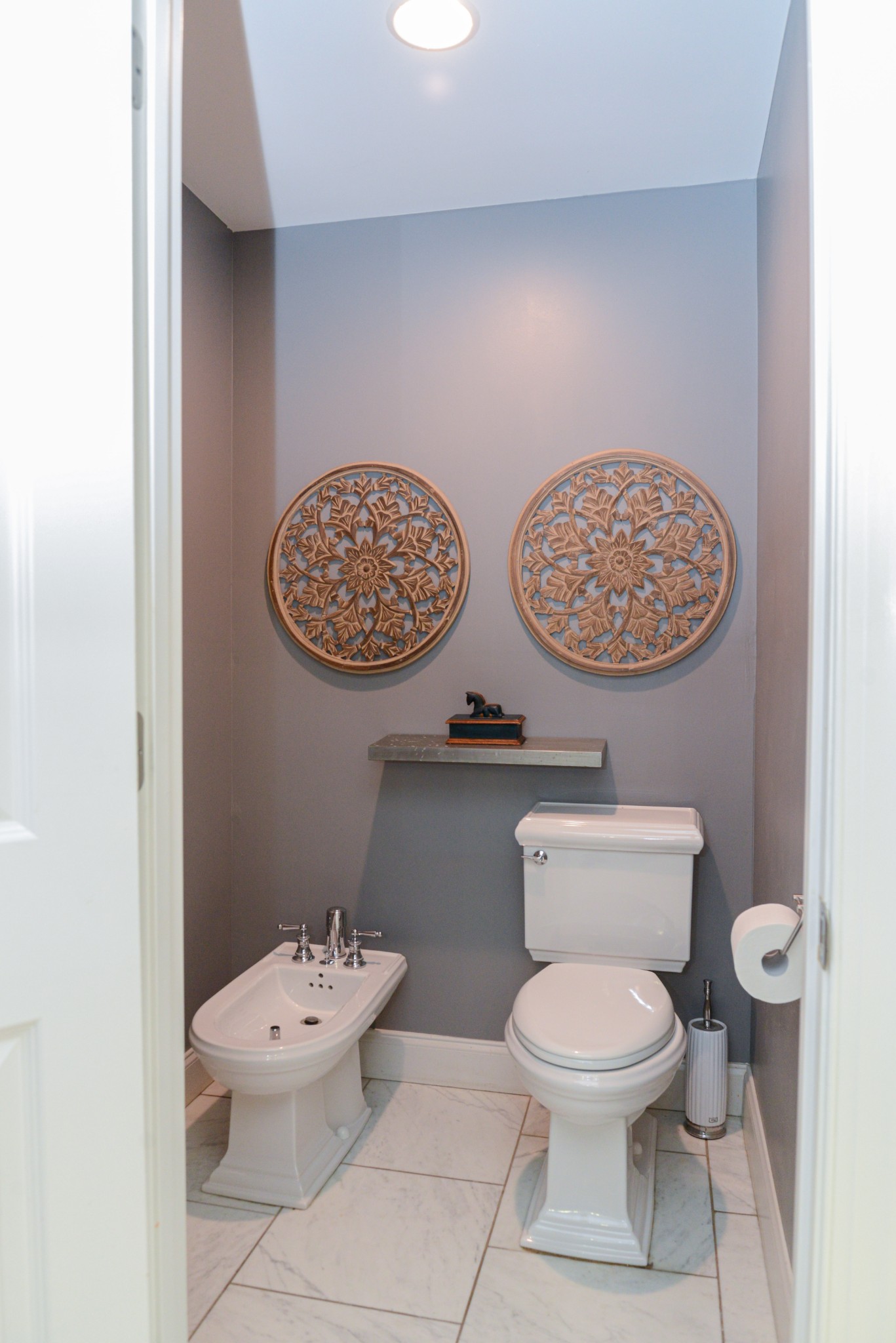 2905 Snowden Road Nashville, TN 37204 - Photo 31 of 40 a white toilet sitting next to a bathroom sink