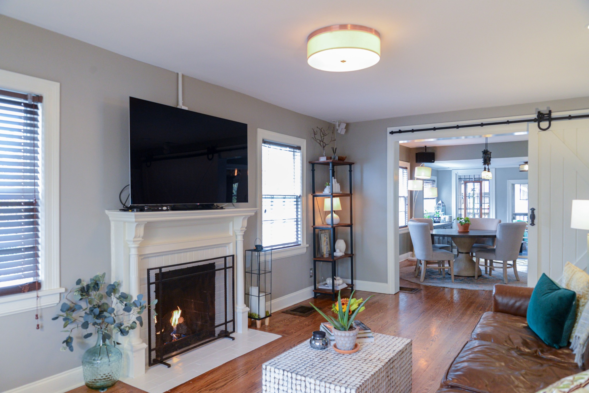 2905 Snowden Road Nashville, TN 37204 - Photo 7 of 40 a living room with furniture a flat screen tv and a fireplace