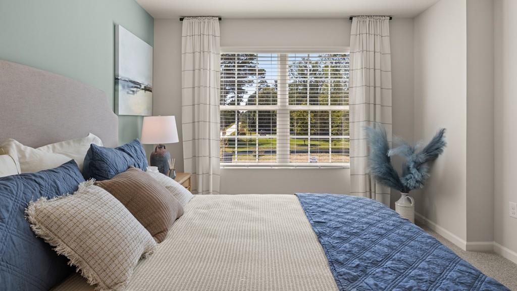 4 Sweetspire Drive Northwest Rome, GA 30165 - Photo 22 of 47 a bedroom with a bed and wooden floor