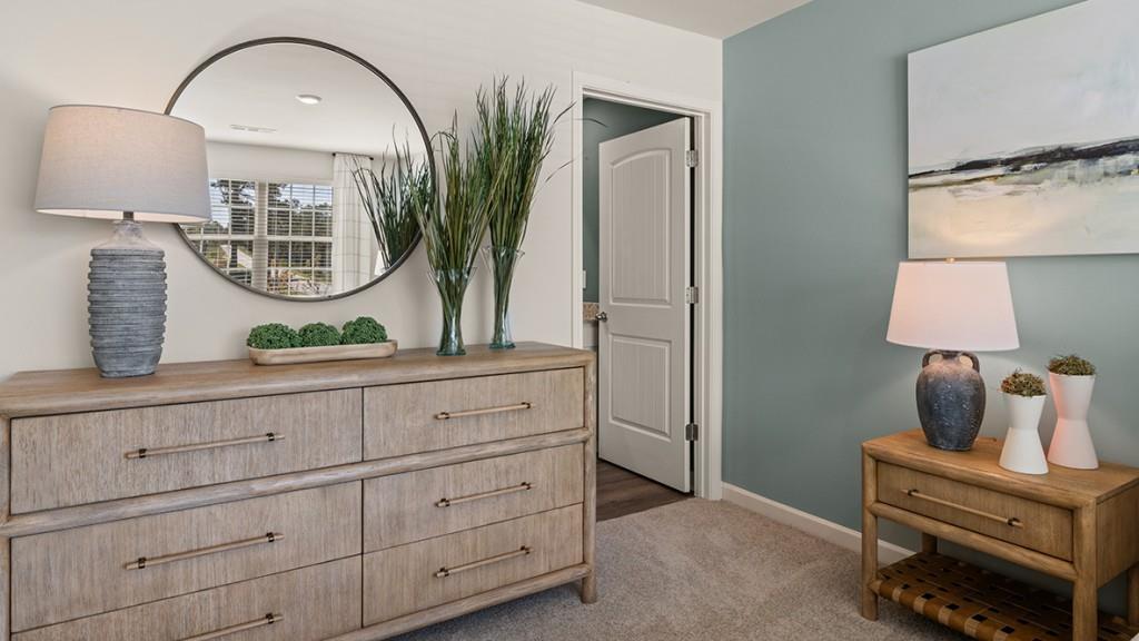4 Sweetspire Drive Northwest Rome, GA 30165 - Photo 25 of 47 a bathroom with a sink and a mirror