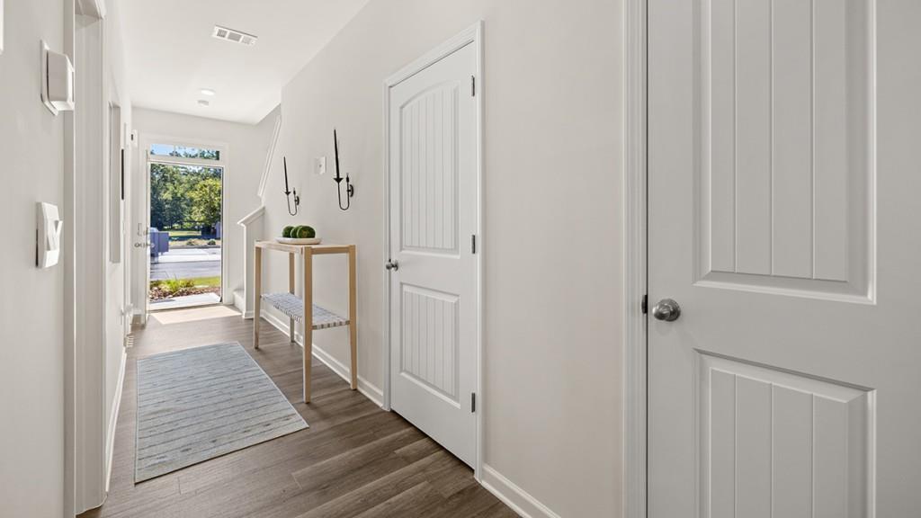 4 Sweetspire Drive Northwest Rome, GA 30165 - Photo 3 of 47 a view of a hallway with wooden floor and staircase