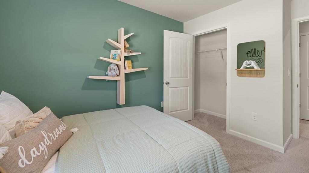 4 Sweetspire Drive Northwest Rome, GA 30165 - Photo 36 of 47 a bedroom with a bed and a painting on the wall