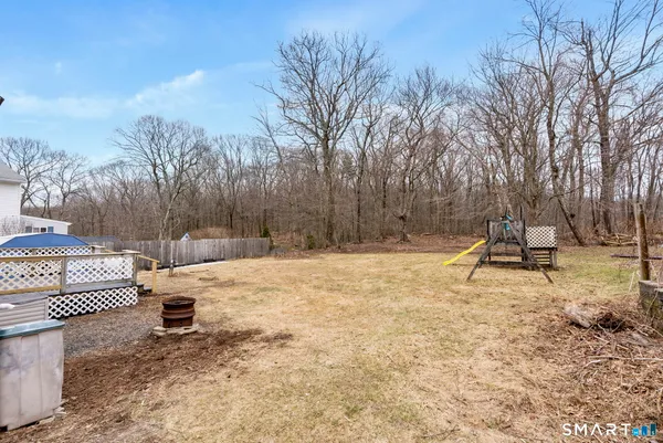 a view of the backyard of a house