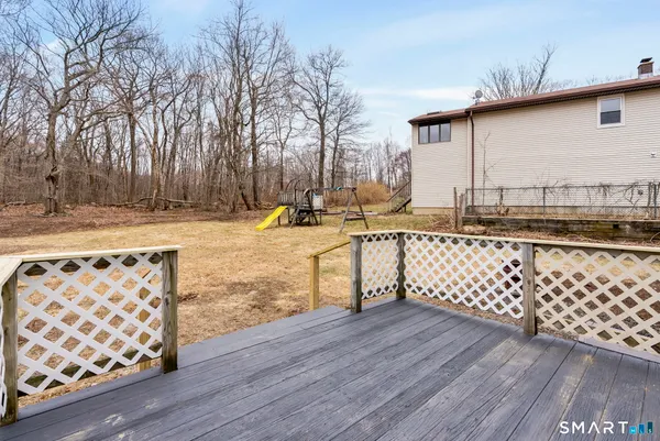 a view of a terrace with wooden fence