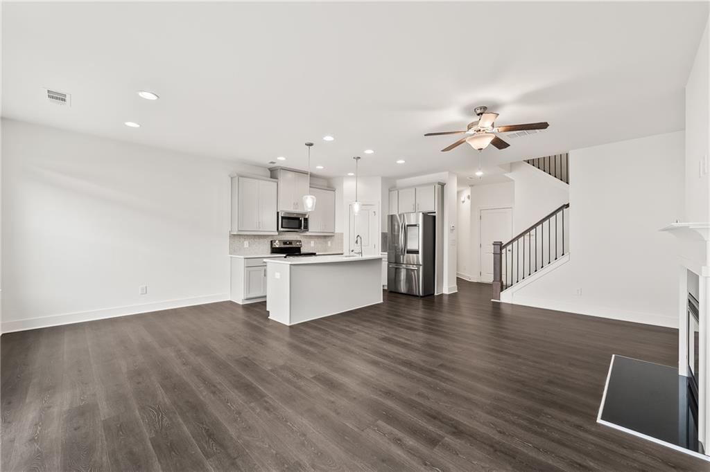 98 Auburn Valley Way Auburn, GA 30011 - Photo 11 of 47 a view of kitchen with sink and refrigerator