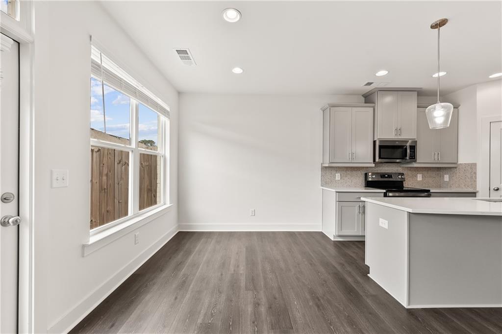 98 Auburn Valley Way Auburn, GA 30011 - Photo 13 of 47 a view of a kitchen with electric appliances