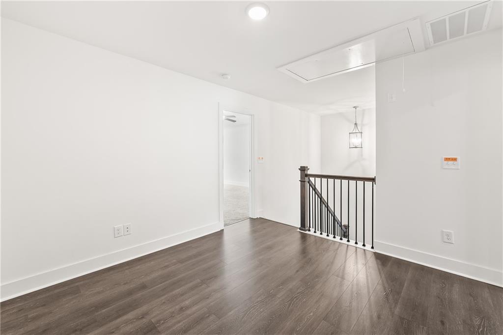 98 Auburn Valley Way Auburn, GA 30011 - Photo 22 of 47 a view of a hallway with wooden floor